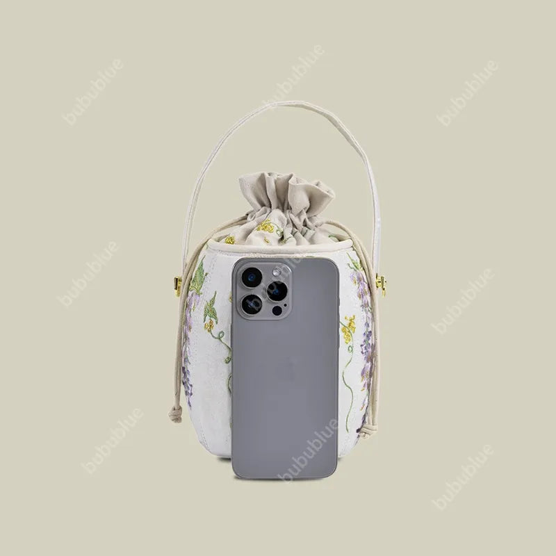 Wisteria Embroidered Drawstring Bucket Bag in Cream Satin